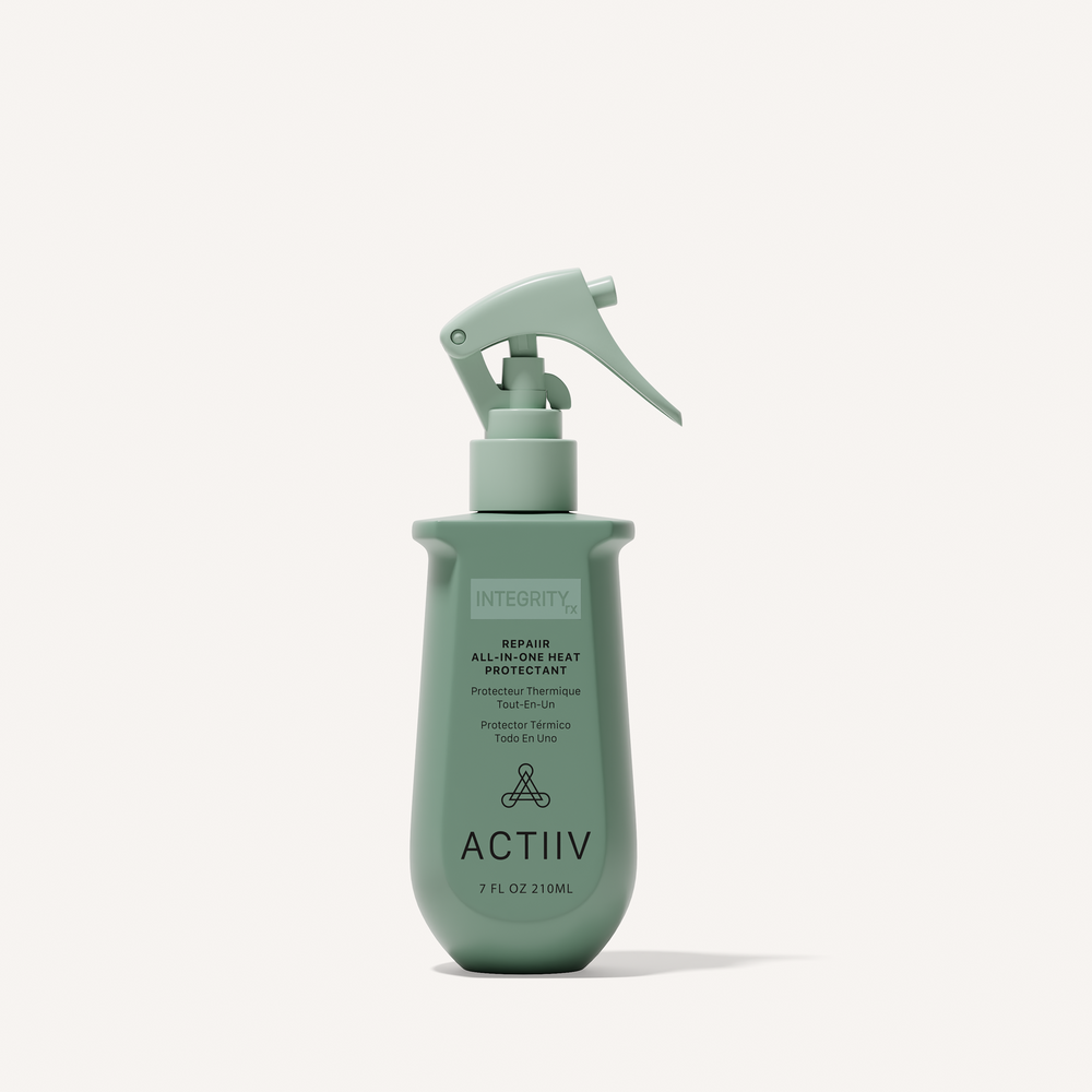 ACTIIV Integrity Rx Repair All-In-One Heat Protectant 7 oz spray for heat protection, frizz control, and smoother, healthier-looking hair.