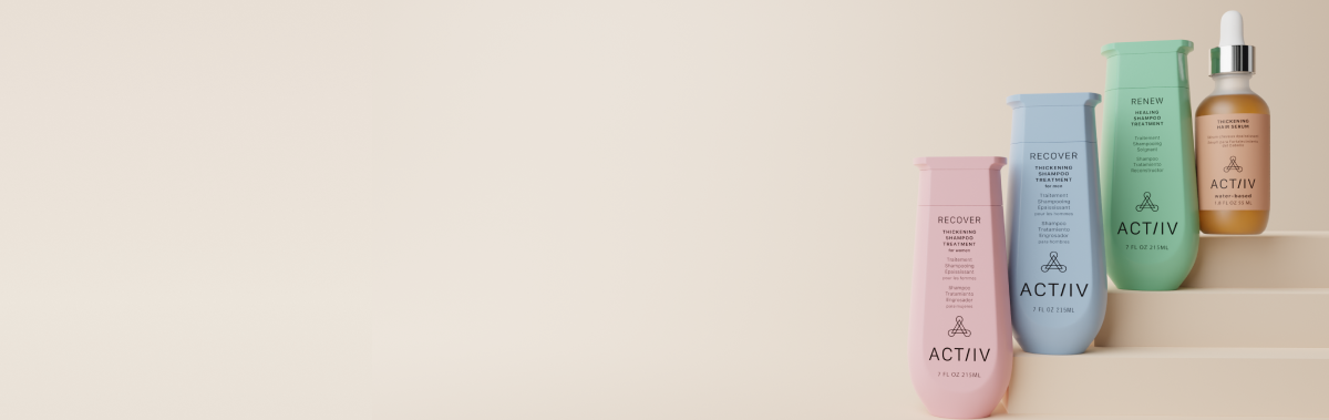 Collection of ACTIIV hair and scalp health products on a beige background