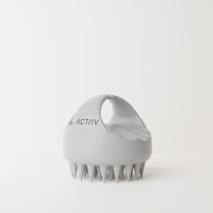 Actiiv silicone scalp massage brush designed to gently exfoliate the scalp and enhance shampoo application