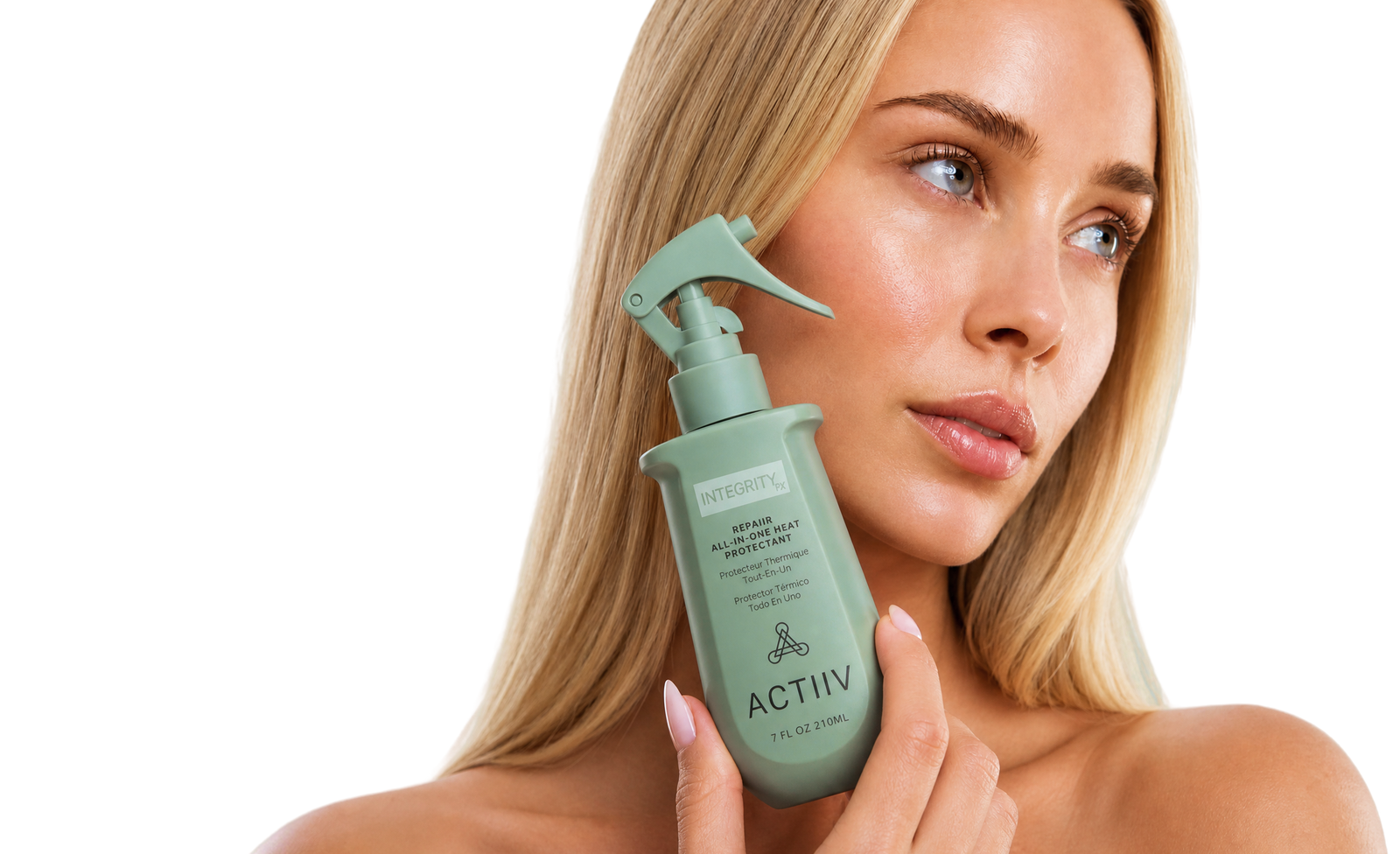 Model with smooth blonde hair holding ACTIIV INTEGRITYrx Repair All-In-One Heat Protectant spray for heat protection, smoother hair and frizz control.